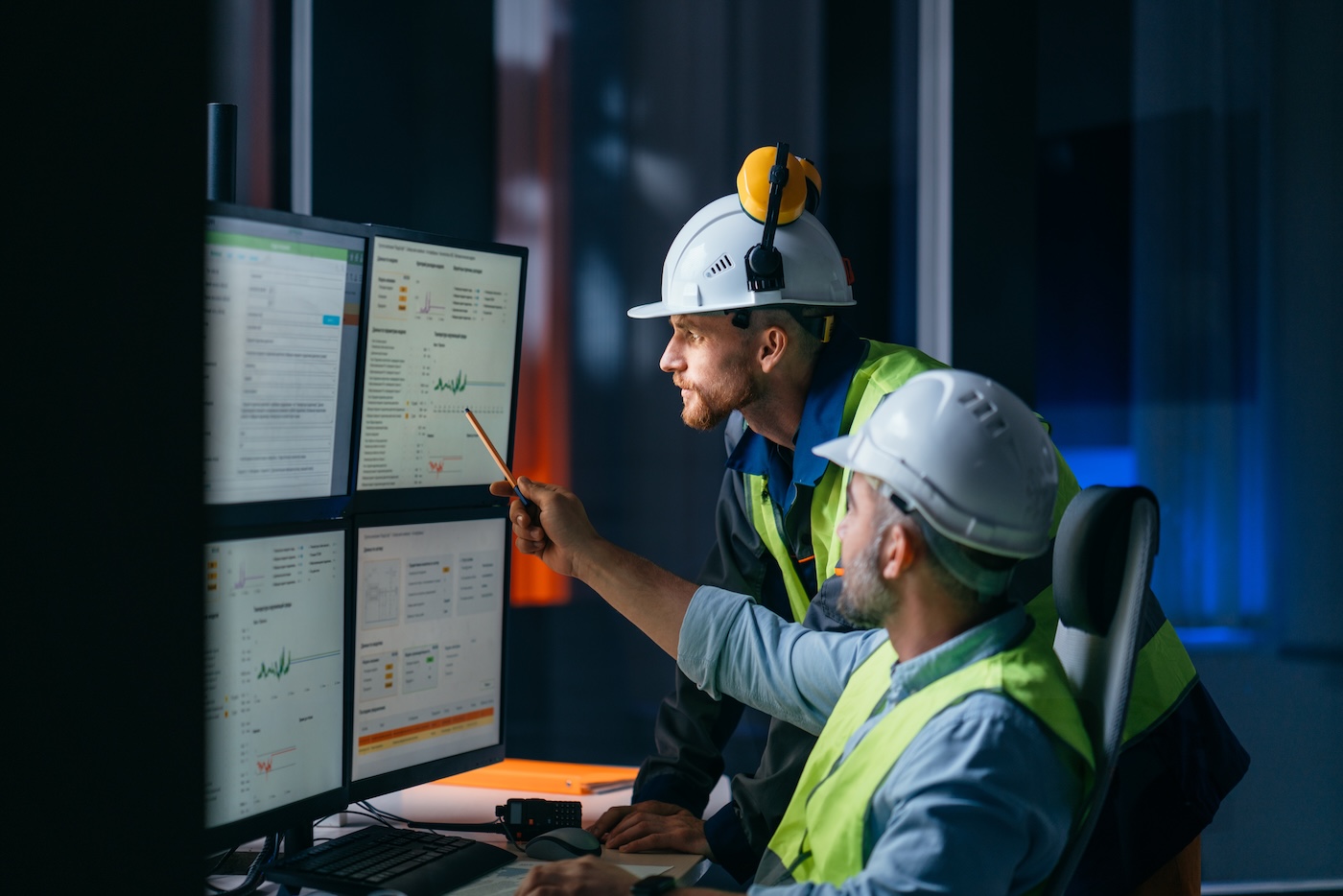 Group of operators control process on product line uses industry 4.0 and digital technology on modern factory
